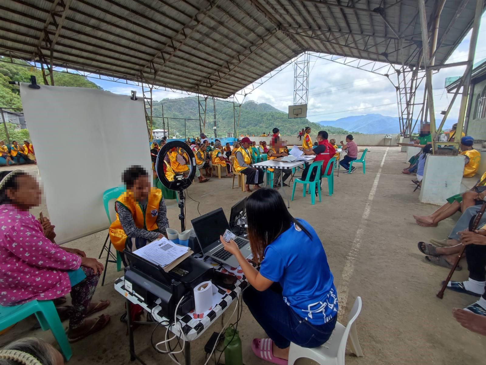 RA Paloma-Cee Foken registering a senior citizen