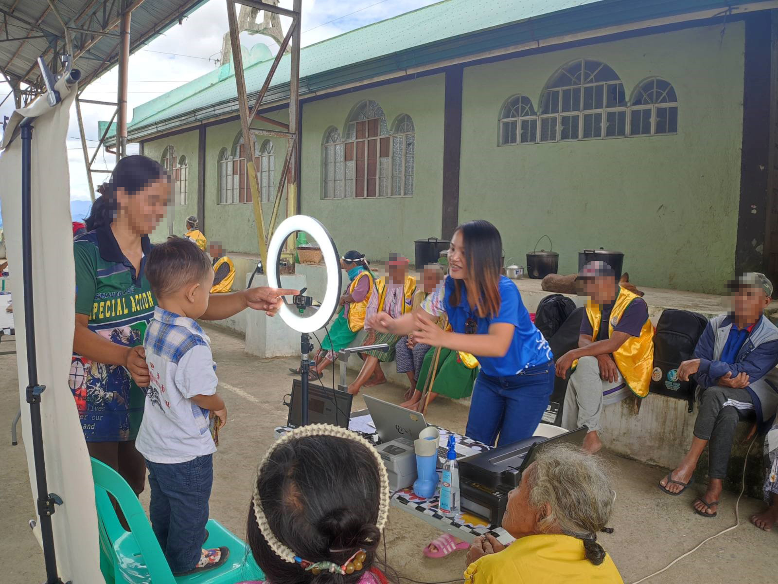 RA Paloma-Cee Foken registering 5 years old client at Guinaang, Bontoc.