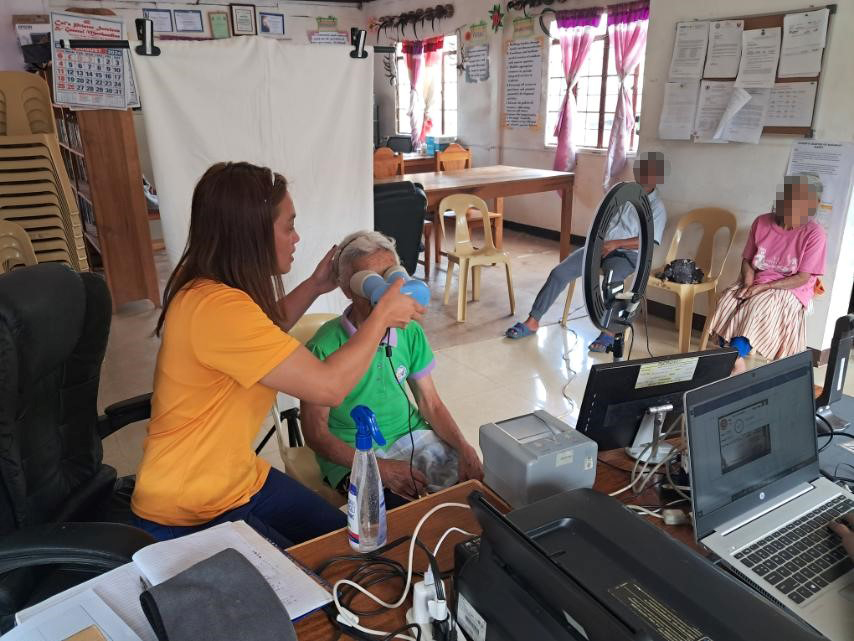 RCS Langpawen assisting a senior citizen at Mainit